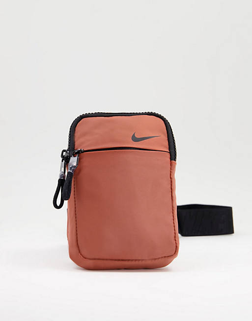 Nike Essentials iridescent flight bag in orange