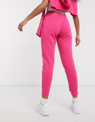 Nike Essentials pink slim joggers | ASOS