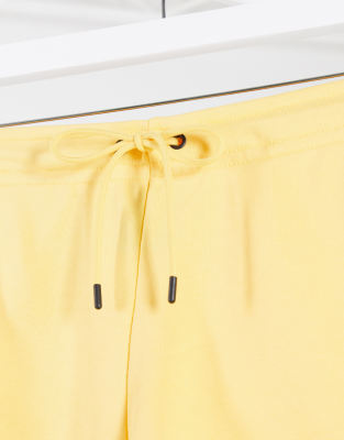 nike essentials shorts in yellow