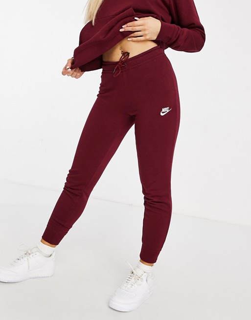 Nike essentials slim joggers in burgundy | ASOS
