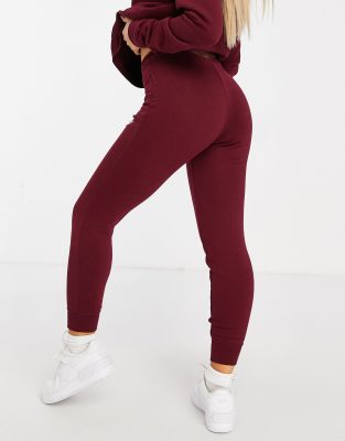 nike burgundy essentials slim joggers