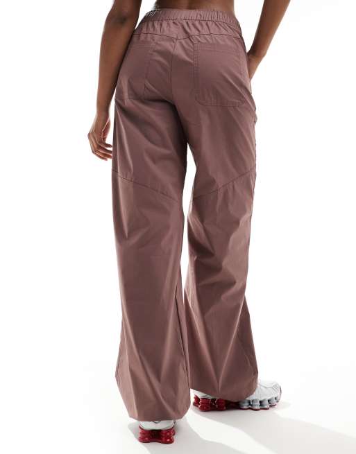 Nike essentials woven pants in purple | ASOS