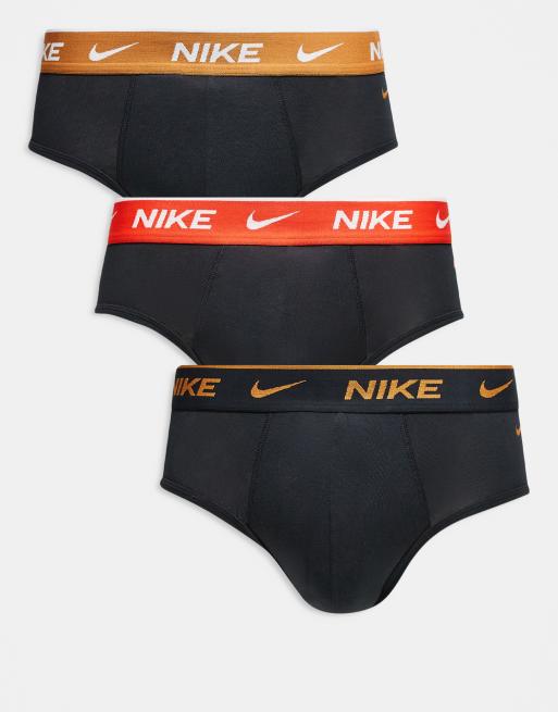 Nike - Everyday - Confezione da 3 paia di slip ampi in cotone elasticizzato neri con fascia in vita colorata nera, oro e rossa 