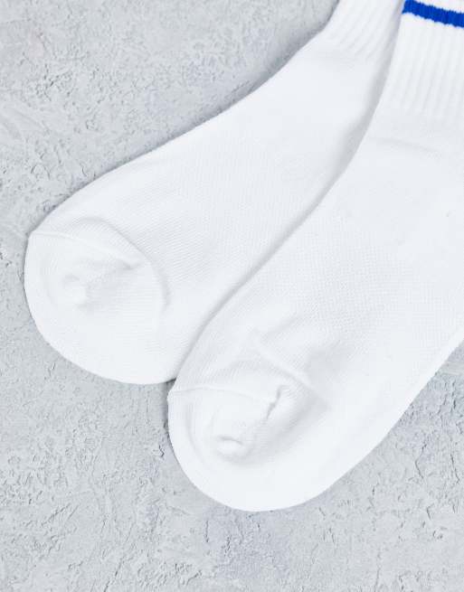 White nike socks store with blue swoosh