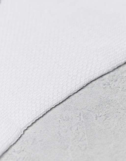 Nike - Everyday Essentials - Pakke med 3 par hvide usynlige sokker med logoprint i forskellige farver, 4 af 4