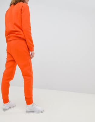 nike orange tracksuit womens