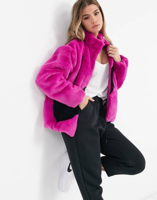 Nike faux fur oversized swoosh jacket in purple | ASOS