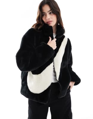 faux fur Swoosh jacket in black