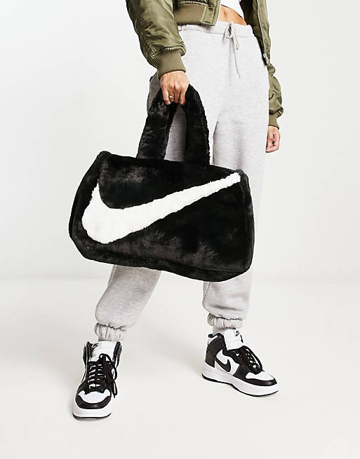 Nike Faux Fur tote bag in black | ASOS