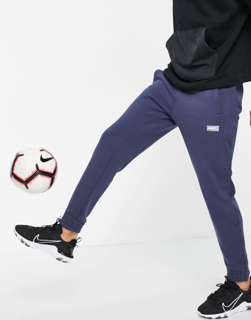 Nike FC fleece joggers in blue