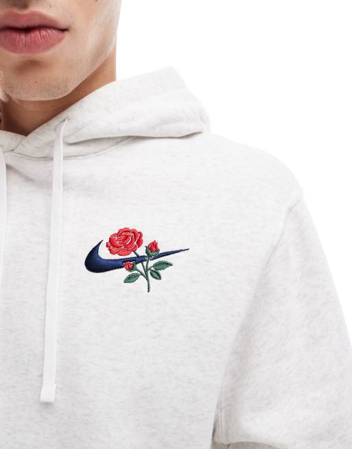 Nike Felpa con cappuccio grigio chiaro con logo floreale ASOS