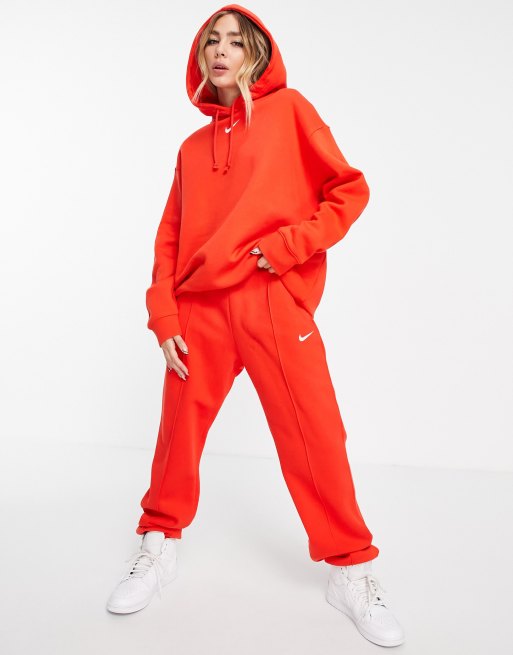 Nike - Felpa con cappuccio in pile rosso Cile