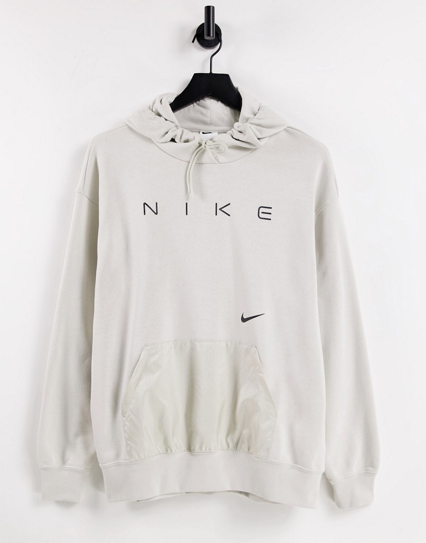 Felpa Neutro donna Nike - Felpa con cappuccio oversize in pile color osso chiaro con logo-Neutro
