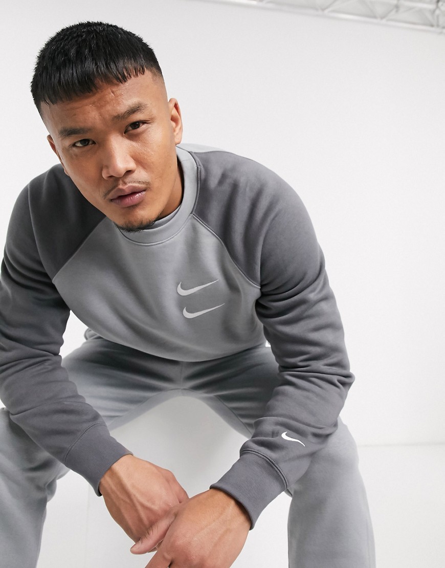 Nike - Felpa girocollo grigia con logo Nike-Grigio