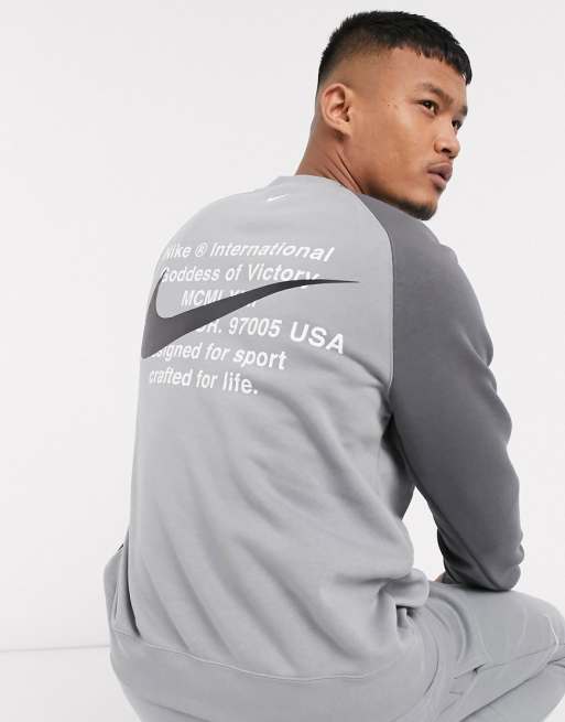 Nike Felpa girocollo grigia con logo Nike Felpa girocollo grigia con logo