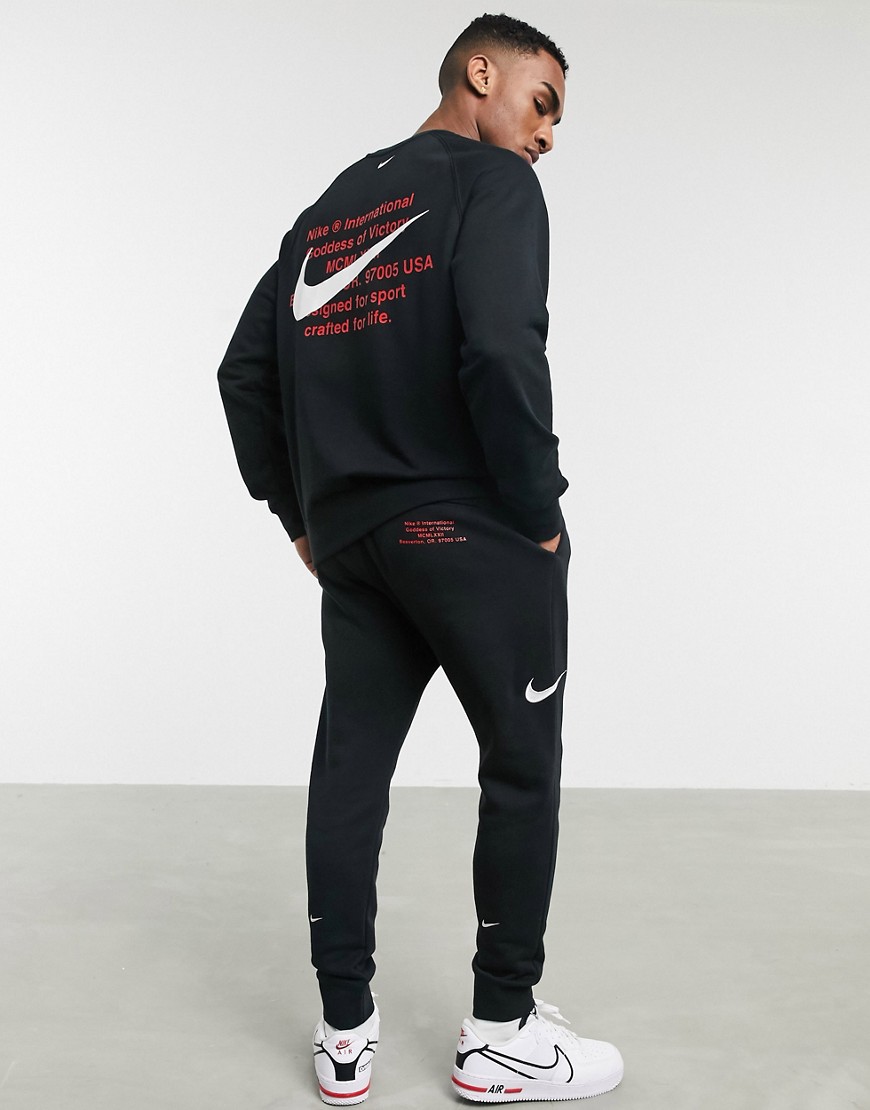 Nike - Felpa girocollo nera con logo Nike-Nero