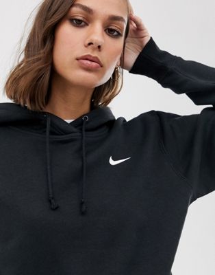 Nike - Felpa oversize con cappuccio e logo Nike piccolo nera | ASOS