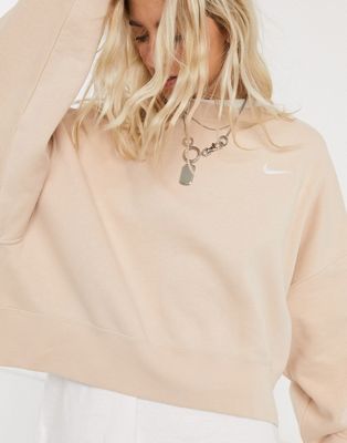 Nike - Felpa oversize squadrata con logo Nike mini beige chiaro | ASOS