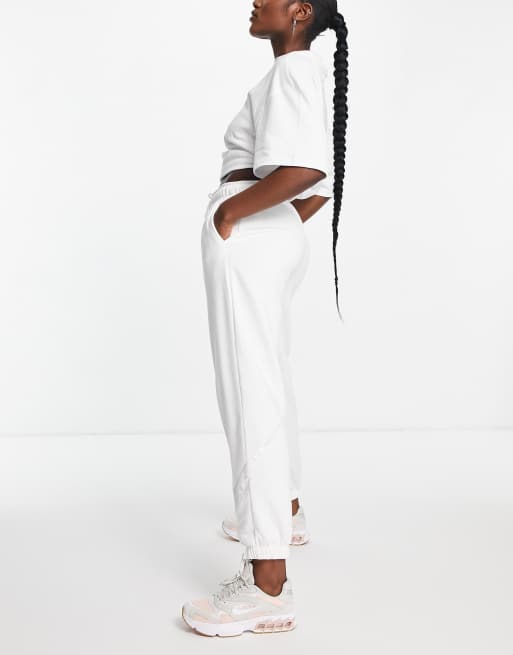 Nike Femme Pack cuffed sweatpants in white SUIT 17 ASOS