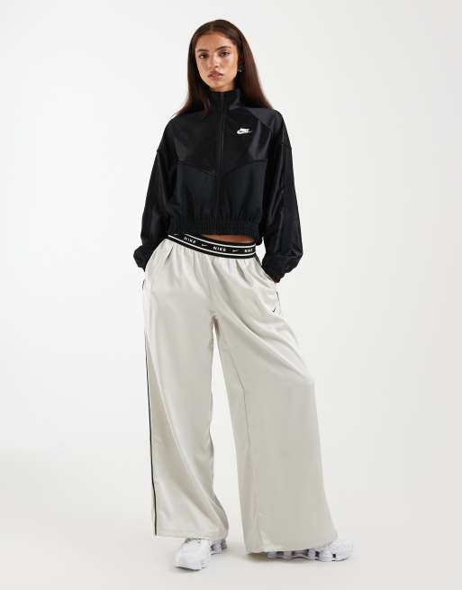 Nike Festival cropped full zip jacket in black | ASOS