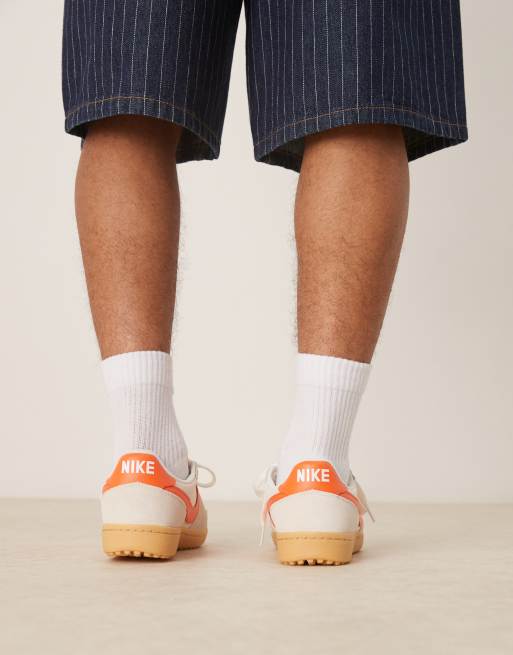 Nike Field General sneakers in off white and orange | ASOS