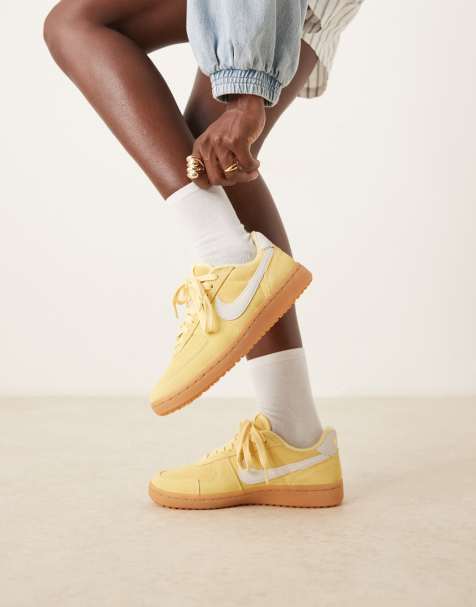 Nike Field General trainers in yellow and white - view 1