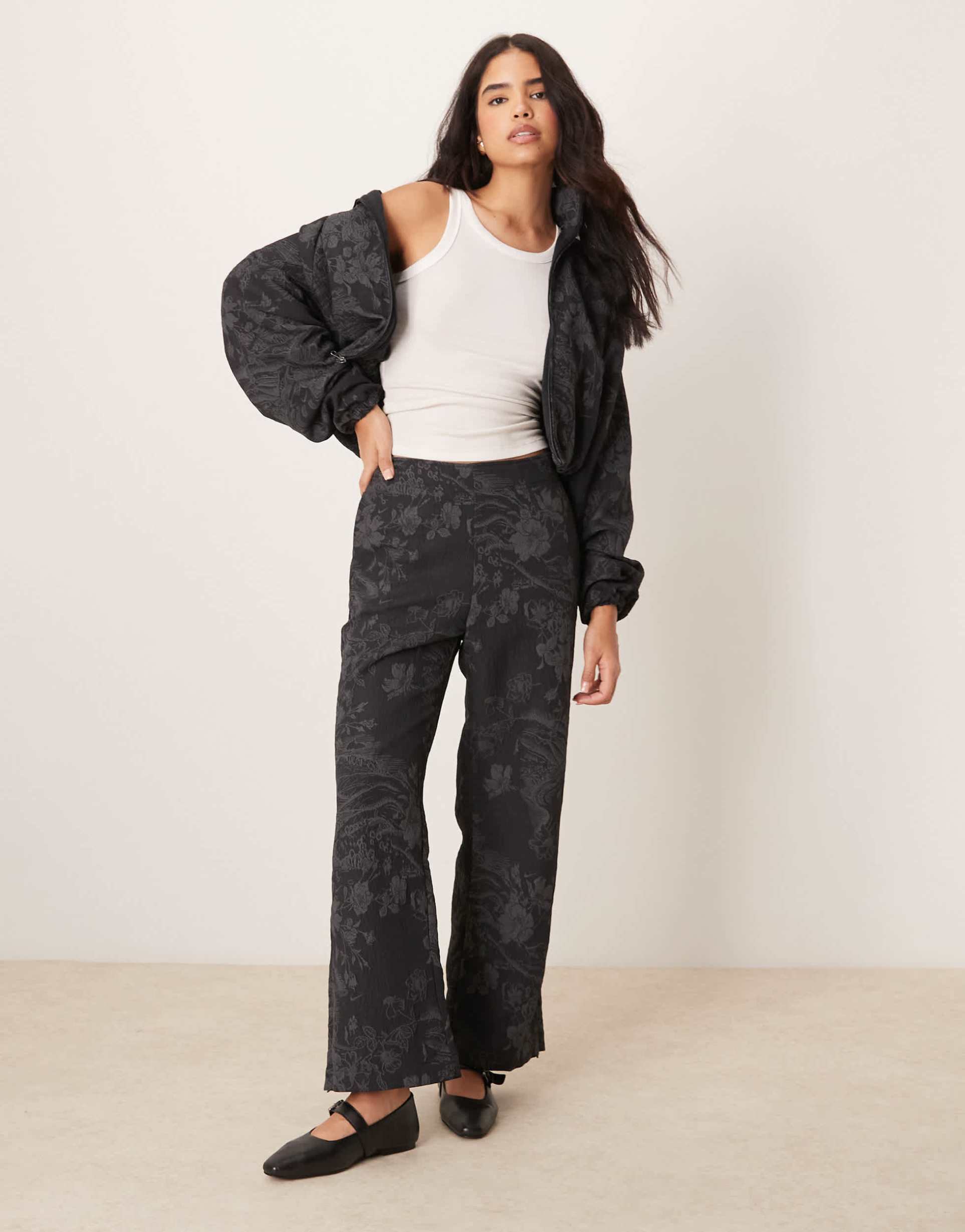 nike flared jacquard print pants in black