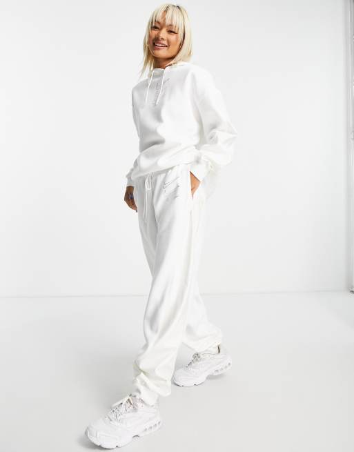 Nike fleece joggers in white and iridescent ASOS