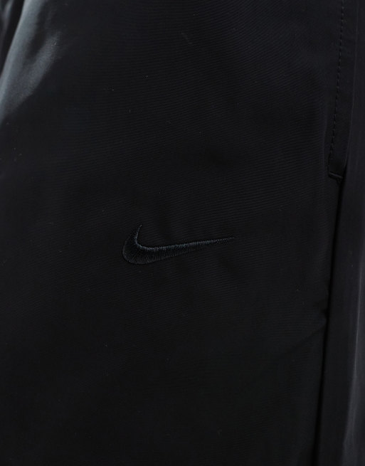 Nike - Fleece joggingbroek met swoosh en rits in zwart, 3 van 5