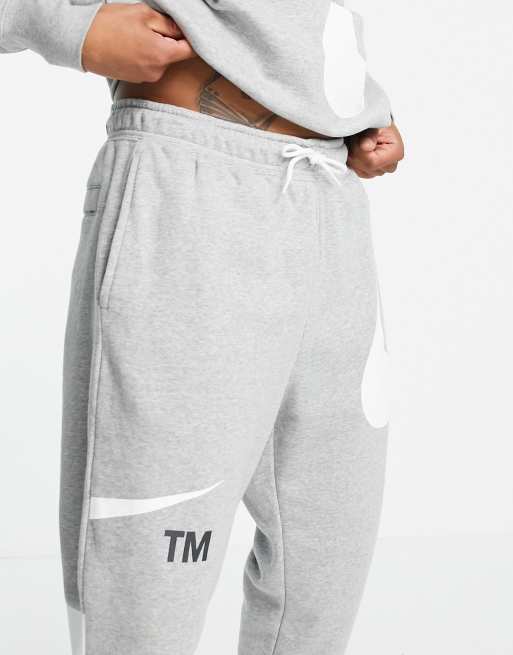 Nike swoosh grey joggers sale