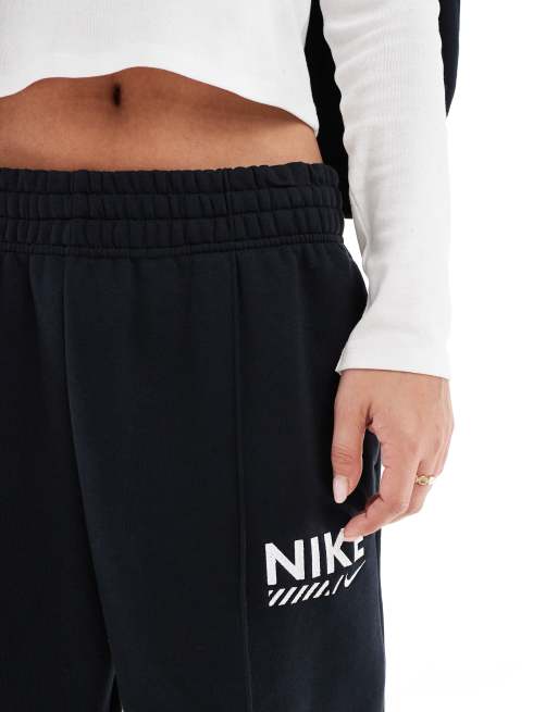 Nike - Fleece joggingbroek met swoosh in zwart , 4 van 5