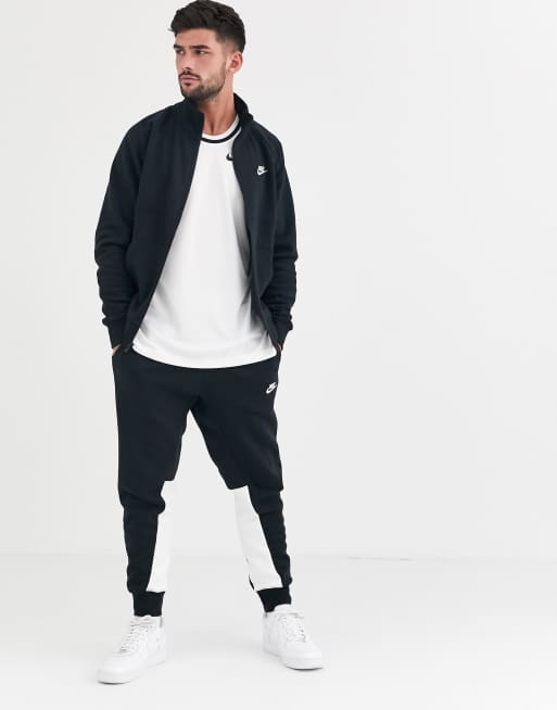 Nike fleece tracksuit hot sale set in black