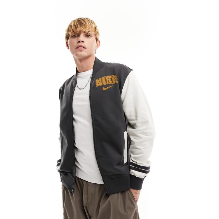 Nike black best sale varsity jacket