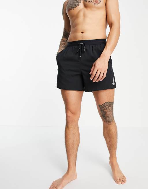 En la mayoría de los casos para agregar irregular Nike Flex Stride 5inch shorts in black | ASOS