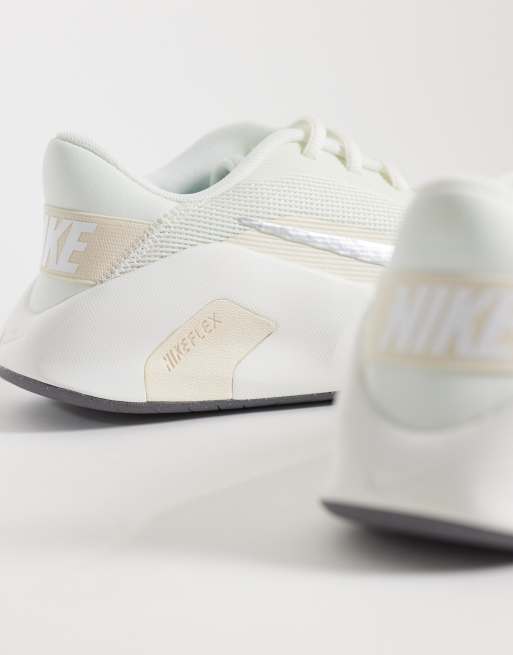 Nike Flex Training sneaker in chalk white with light blue detail, 2 of 5