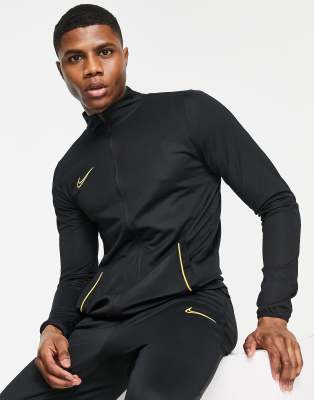 Nike orange and store black tracksuit