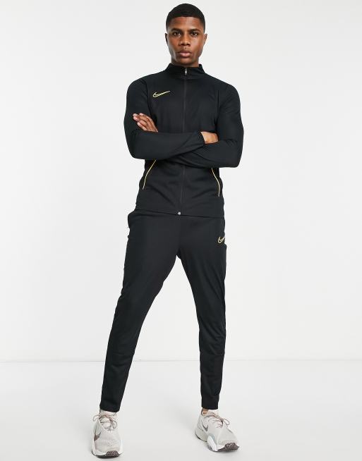 Nike black 2025 and orange tracksuit