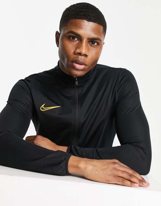 Nike black 2025 orange tracksuit