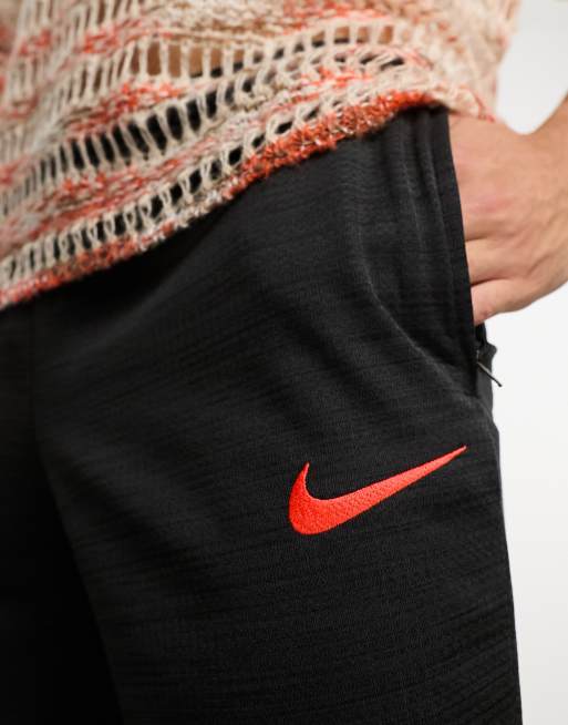 Jogging nike best sale noir rouge