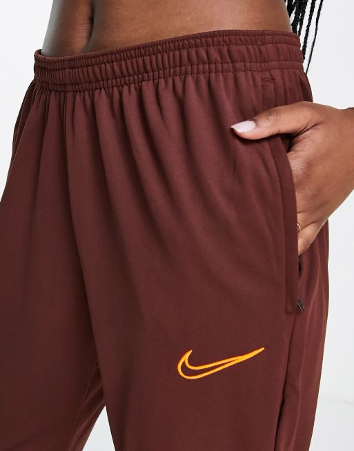 Nike Football Academy DriFIT joggers in bronze ASOS
