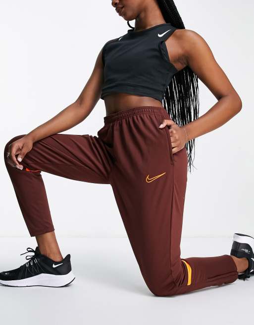 Nike Football Academy DriFIT joggers in bronze ASOS