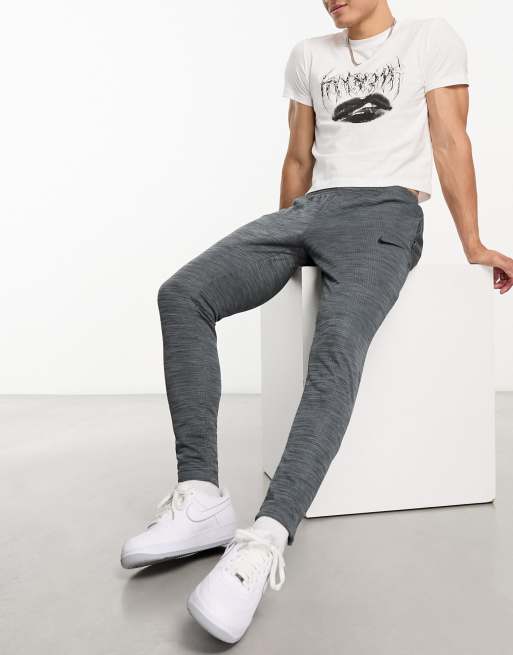 Nike Football Academy DriFit joggers in grey ASOS