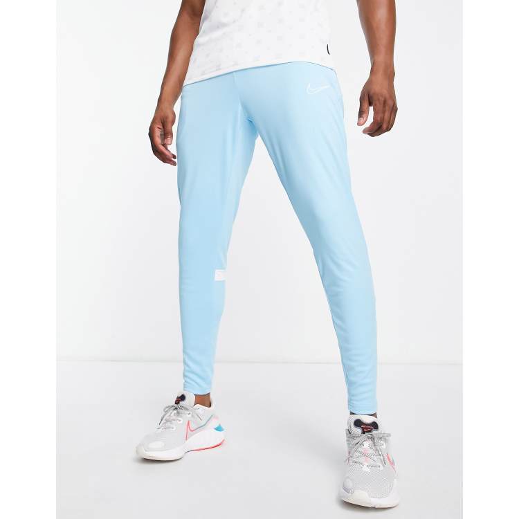 Nike academy outlet pants blue