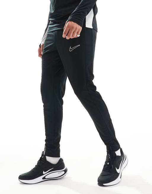 Nike Football Academy Dri FIT Jogginghose in Schwarz mit Bahnendesign