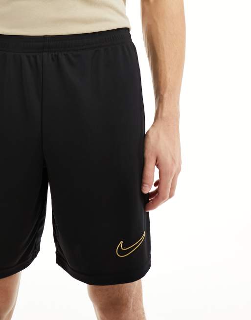 Nike Football Academy Dri Fit shorts in black and yellow