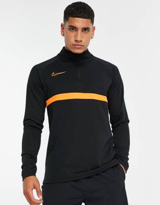 Nike store academy orange