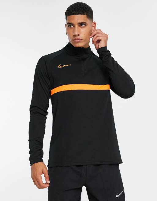 Nike academy tracksuit black and sale orange