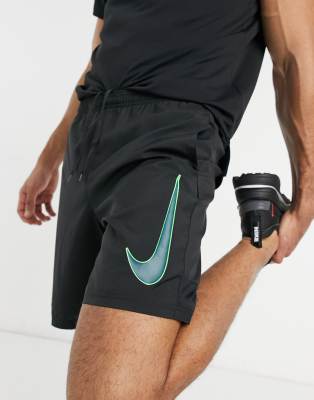 green nike football shorts