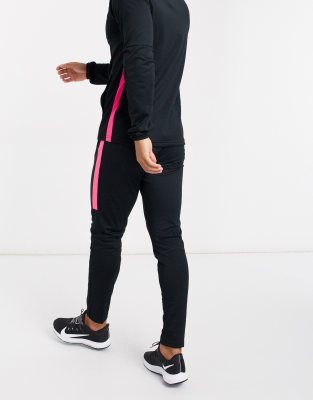 black and pink nike tracksuit