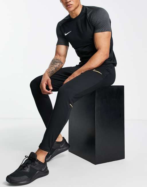 Nike football academy tapered joggers deals in black